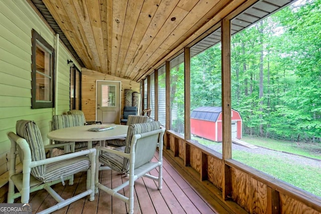 4618 Jones Gap Rd, Hiawassee, GA 30546 - sunroom featuring lofted ceiling and outdoor dining area