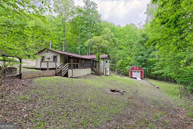 4618 Jones Gap Rd, Hiawassee, GA 30546 - back of house with stairs and a view of trees