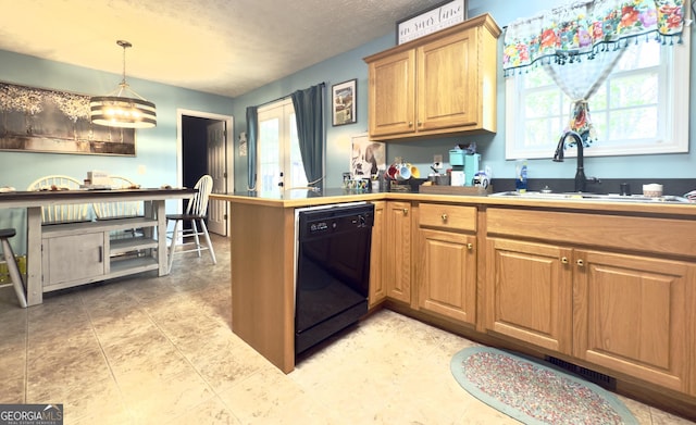 50 Kensington Dr, Cleveland, GA 30528 - kitchen featuring dishwasher, a sink, a peninsula, decorative light fixtures, and a textured ceiling
