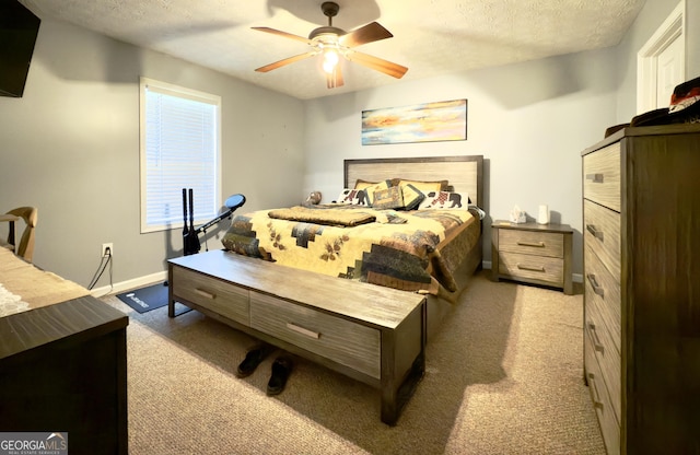 50 Kensington Dr, Cleveland, GA 30528 - carpeted bedroom with a textured ceiling, a ceiling fan, and baseboards