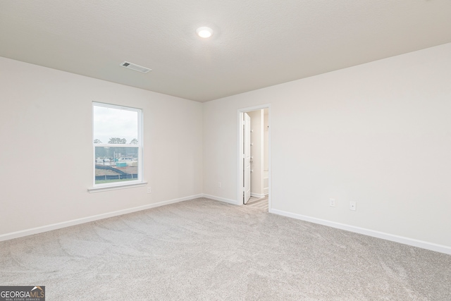 295 Limestone Cir, Conyers, GA 30013 - unfurnished room featuring light colored carpet, baseboards, and recessed lighting