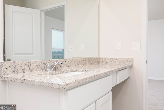 295 Limestone Cir, Conyers, GA 30013 - bathroom featuring vanity and baseboards
