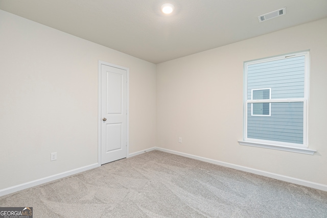 295 Limestone Cir, Conyers, GA 30013 - carpeted empty room with baseboards
