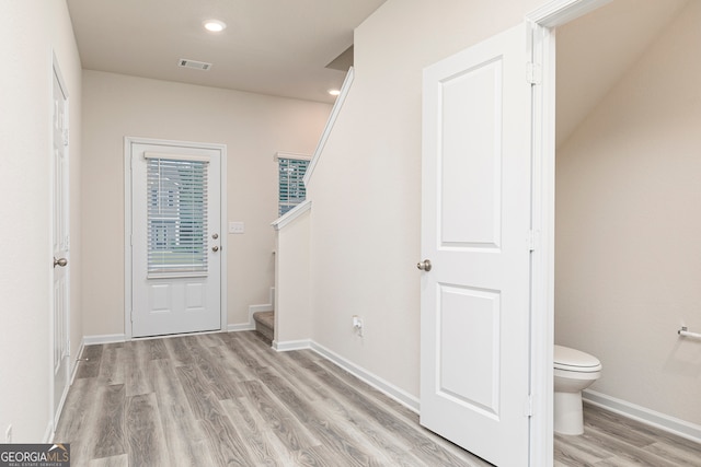 295 Limestone Cir, Conyers, GA 30013 - hallway featuring light wood-style flooring, stairway, baseboards, and recessed lighting
