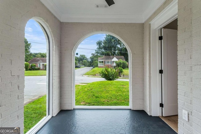1283 Beecher St SW, Atlanta, GA 30310 - doorway to outside featuring healthy amount of natural light, ornamental molding, and brick wall