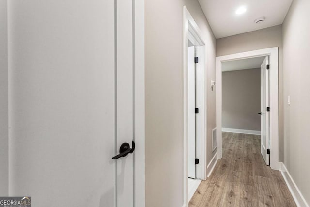 1283 Beecher St SW, Atlanta, GA 30310 - hallway featuring light wood-style flooring and baseboards