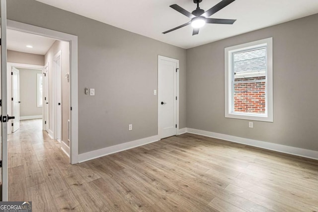 1283 Beecher St SW, Atlanta, GA 30310 - unfurnished bedroom with light wood-style flooring and ceiling fan