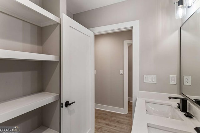1283 Beecher St SW, Atlanta, GA 30310 - bathroom with wood finished floors and double vanity