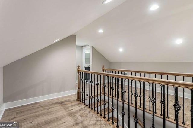 1283 Beecher St SW, Atlanta, GA 30310 - hall with vaulted ceiling, wood finished floors, recessed lighting, and an upstairs landing
