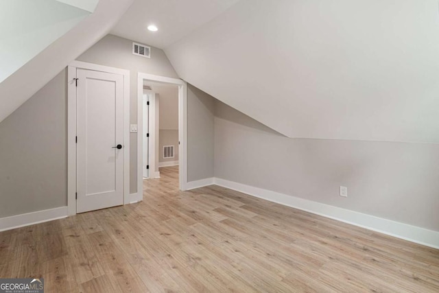 1283 Beecher St SW, Atlanta, GA 30310 - additional living space featuring light wood finished floors, lofted ceiling, and recessed lighting