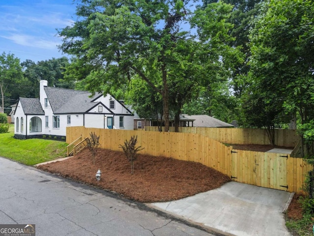 1283 Beecher St SW, Atlanta, GA 30310 - view of front of property featuring a chimney and a shingled roof