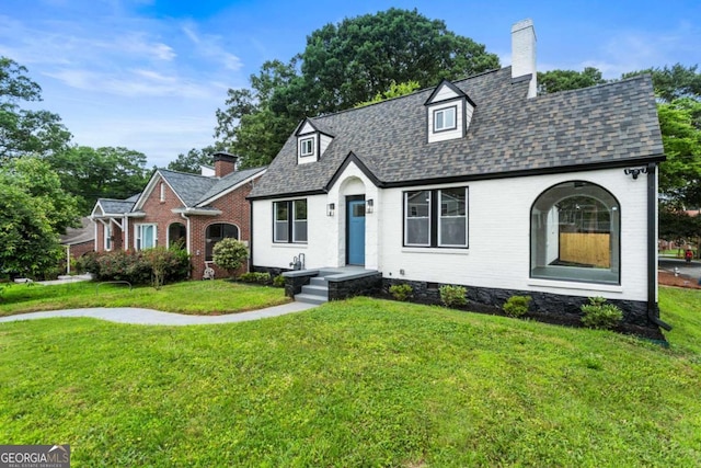 1283 Beecher St SW, Atlanta, GA 30310 - view of front of home featuring brick siding, a front yard, a chimney, and a shingled roof