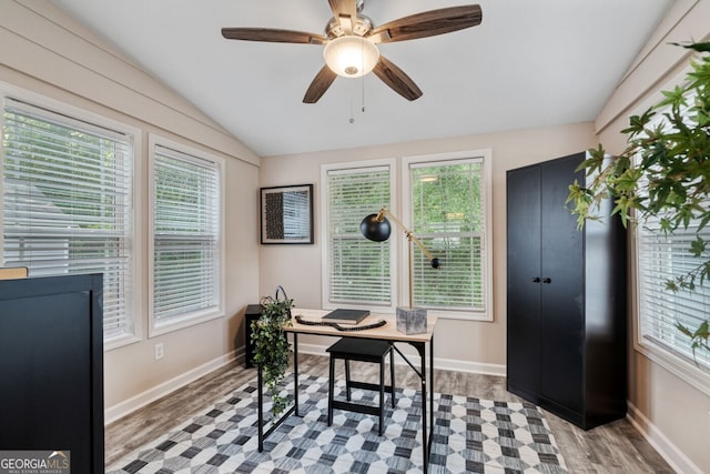 1087 Berkley Dr SE, Smyrna, GA 30082 - office area featuring vaulted ceiling, plenty of natural light, light wood-style flooring, and baseboards
