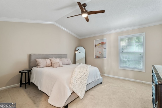 1087 Berkley Dr SE, Smyrna, GA 30082 - bedroom with ornamental molding, light colored carpet, baseboards, vaulted ceiling, and a ceiling fan