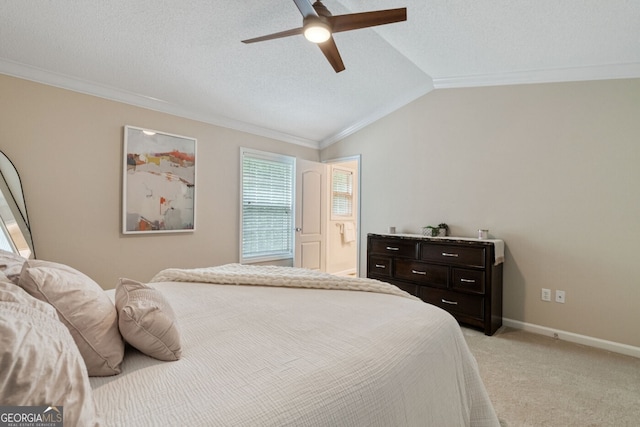 1087 Berkley Dr SE, Smyrna, GA 30082 - bedroom with crown molding, vaulted ceiling, light colored carpet, a ceiling fan, and baseboards