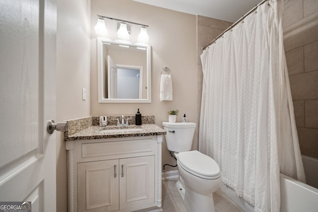 1087 Berkley Dr SE, Smyrna, GA 30082 - full bathroom featuring toilet, vanity, and shower / tub combo