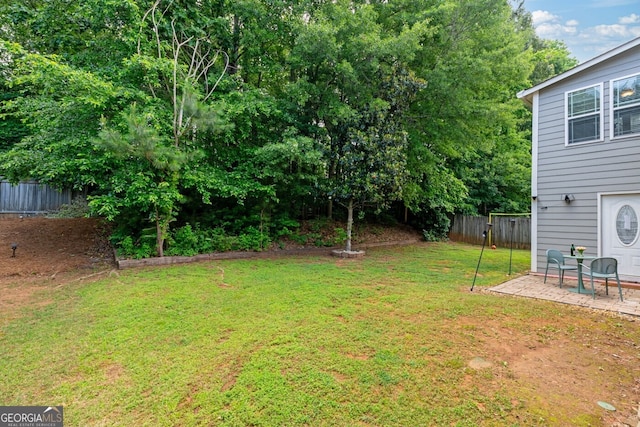 1087 Berkley Dr SE, Smyrna, GA 30082 - view of yard with a patio area