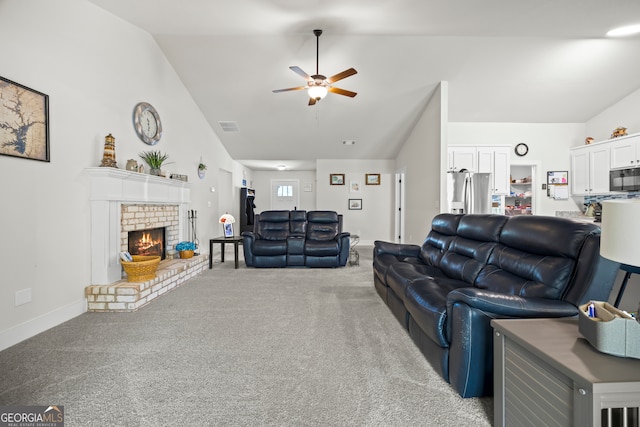 290 Bowers Estates Dr, Hartwell, GA 30643 - carpeted living room featuring a ceiling fan, a brick fireplace, baseboards, and high vaulted ceiling