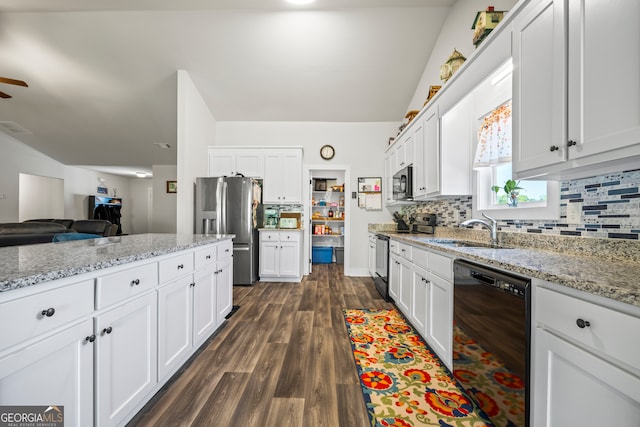 290 Bowers Estates Dr, Hartwell, GA 30643 - kitchen with appliances with stainless steel finishes, decorative backsplash, a sink, dark wood finished floors, and white cabinetry