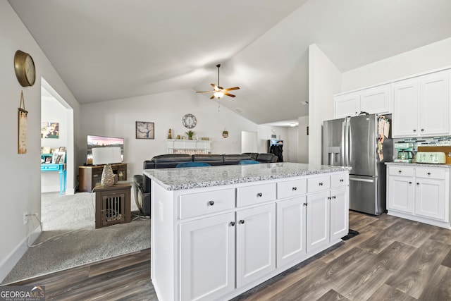 290 Bowers Estates Dr, Hartwell, GA 30643 - kitchen featuring stainless steel fridge, a ceiling fan, open floor plan, vaulted ceiling, and dark wood-type flooring