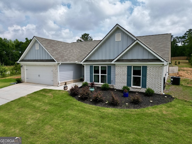 290 Bowers Estates Dr, Hartwell, GA 30643 - view of front of house with board and batten siding, an attached garage, driveway, brick siding, and central air condition unit