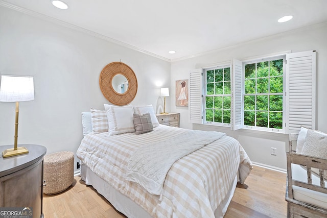 70 Old Ivy Rd NE Unit 57, Atlanta, GA 30342 - bedroom featuring ornamental molding, light wood finished floors, and recessed lighting