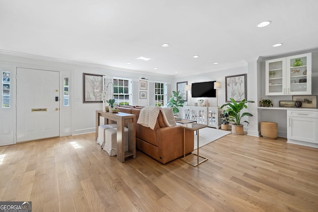 70 Old Ivy Rd NE Unit 57, Atlanta, GA 30342 - living room featuring ornamental molding, light wood-type flooring, healthy amount of natural light, and recessed lighting