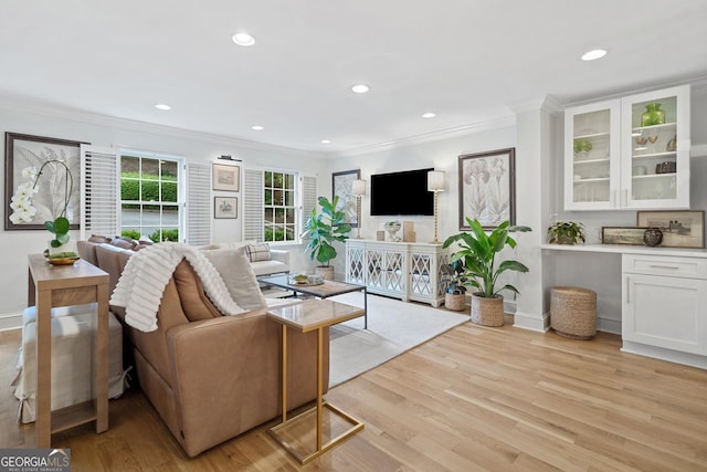 70 Old Ivy Rd NE Unit 57, Atlanta, GA 30342 - living room with crown molding, light wood-style floors, and recessed lighting