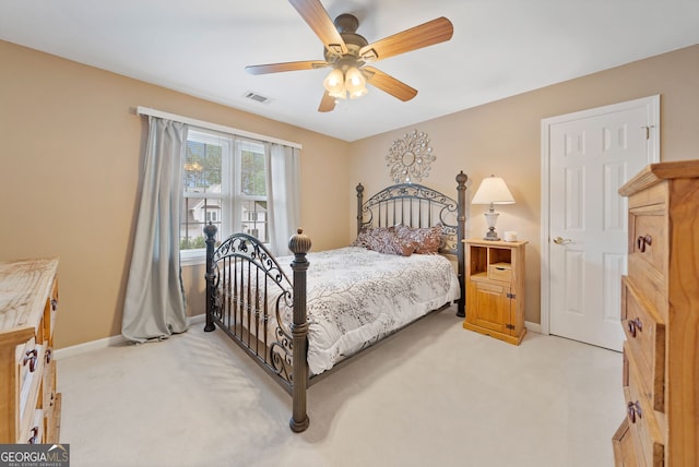 5711 Brynwood Cir NW, Acworth, GA 30101 - bedroom featuring light carpet, baseboards, and ceiling fan