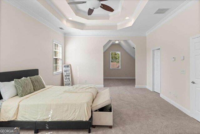 3113 Brians Creek Dr SE, Conyers, GA 30013 - carpeted bedroom featuring crown molding, a tray ceiling, and ceiling fan
