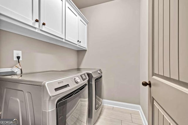 2980 Beards Rd, Buford, GA 30518 - washroom with washer and dryer and cabinet space