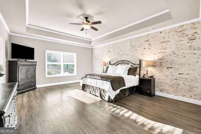 2980 Beards Rd, Buford, GA 30518 - bedroom with a raised ceiling, wallpapered walls, ornamental molding, wood finished floors, and a ceiling fan
