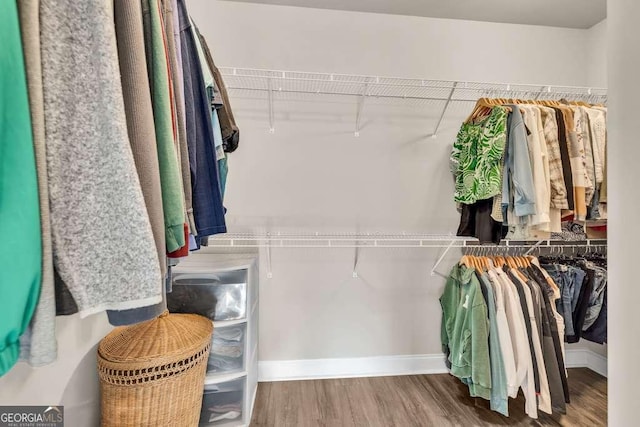 2980 Beards Rd, Buford, GA 30518 - spacious closet featuring wood finished floors