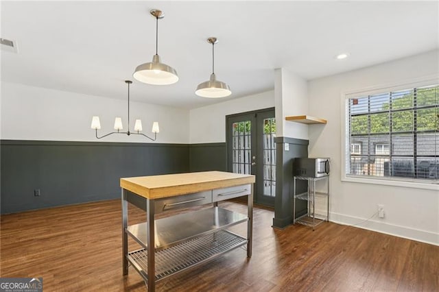 355 Winding River Dr Unit B, Atlanta, GA 30350 - kitchen with french doors, healthy amount of natural light, wood finished floors, a chandelier, and recessed lighting