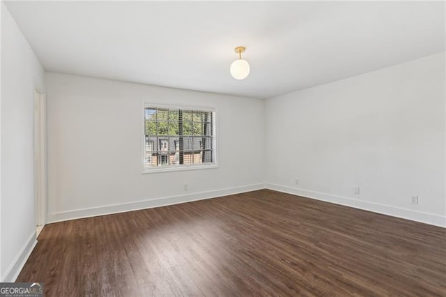 355 Winding River Dr Unit B, Atlanta, GA 30350 - unfurnished room featuring dark wood-type flooring and baseboards