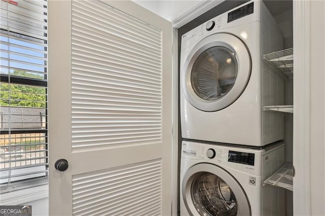 355 Winding River Dr Unit B, Atlanta, GA 30350 - laundry room with stacked washer and clothes dryer