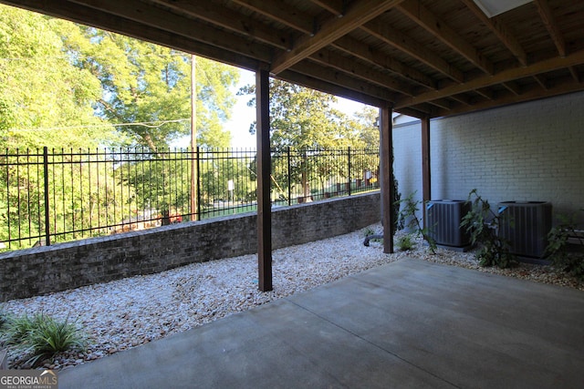 603 W 1st St, Rome, GA 30161 - fenced backyard featuring central AC and a patio area