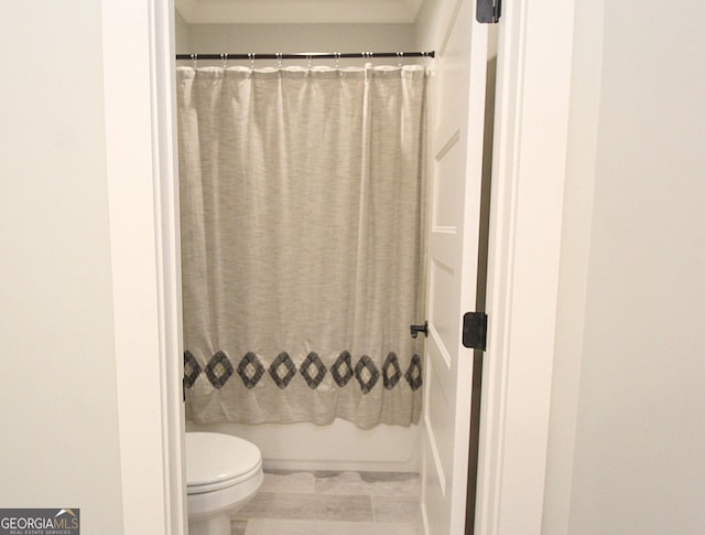 603 W 1st St, Rome, GA 30161 - bathroom featuring toilet and shower / bathtub combination with curtain