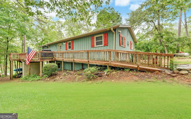 171 Friendship Dr, Hartwell, GA 30643 - back of property with a deck, board and batten siding, and a yard