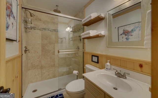 171 Friendship Dr, Hartwell, GA 30643 - bathroom featuring toilet, a shower stall, wainscoting, vanity, and a decorative wall