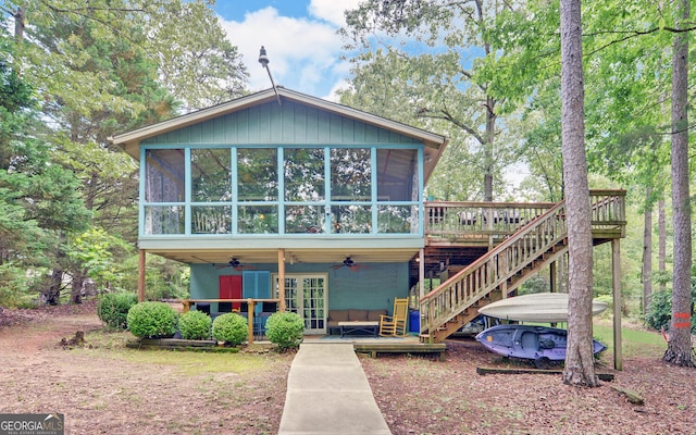 171 Friendship Dr, Hartwell, GA 30643 - back of property featuring a sunroom, a deck, ceiling fan, and stairway