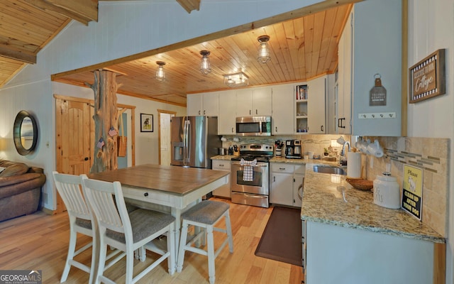 171 Friendship Dr, Hartwell, GA 30643 - kitchen with appliances with stainless steel finishes, wood ceiling, light wood-style floors, a sink, and open shelves