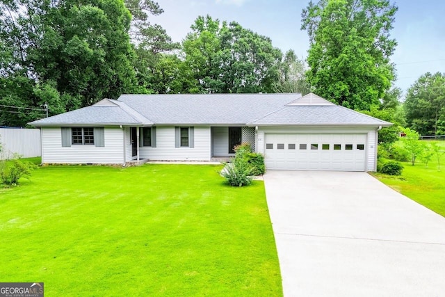65 Pine Haven Ct, Carrollton, GA 30116 - ranch-style home featuring an attached garage, concrete driveway, a front yard, and a shingled roof
