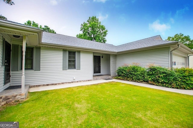 65 Pine Haven Ct, Carrollton, GA 30116 - ranch-style home with a front lawn, a garage, and roof with shingles