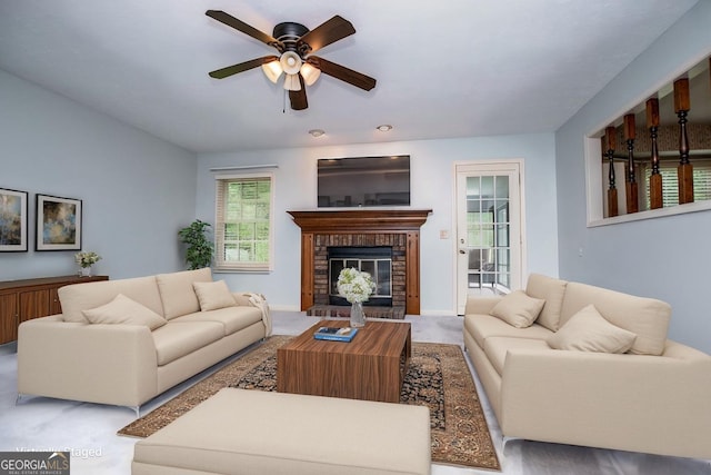 65 Pine Haven Ct, Carrollton, GA 30116 - living area featuring ceiling fan, carpet flooring, and a fireplace