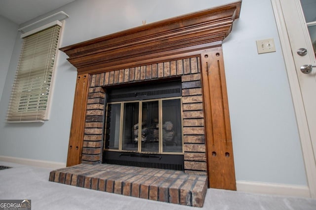 65 Pine Haven Ct, Carrollton, GA 30116 - detailed view of carpet floors, baseboards, and a fireplace