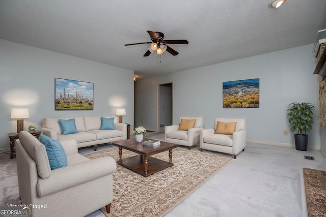 65 Pine Haven Ct, Carrollton, GA 30116 - living area with carpet flooring, a ceiling fan, and baseboards