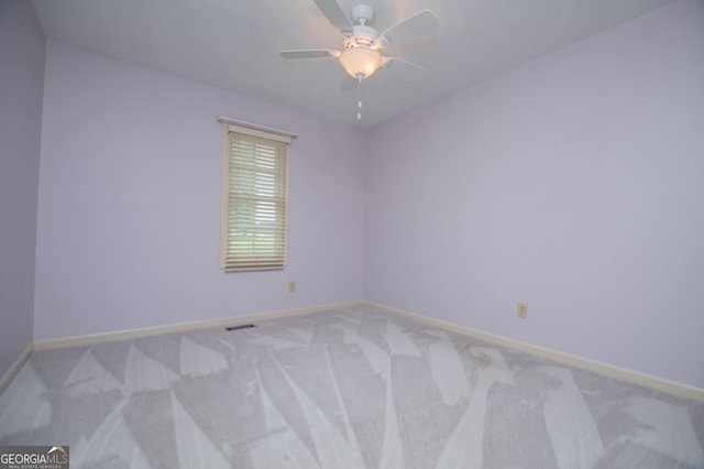 65 Pine Haven Ct, Carrollton, GA 30116 - unfurnished room featuring light colored carpet, baseboards, and ceiling fan