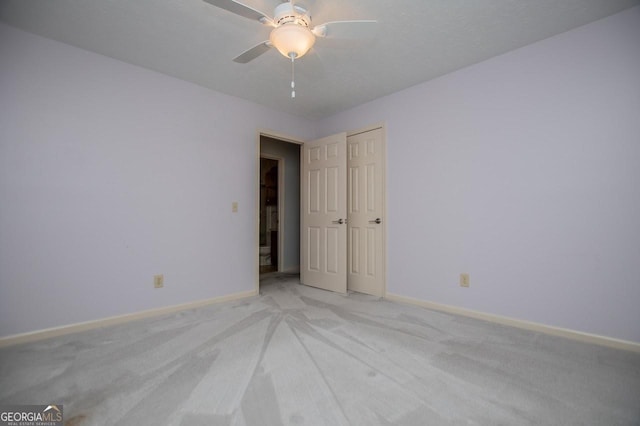 65 Pine Haven Ct, Carrollton, GA 30116 - unfurnished room with light colored carpet, baseboards, and a ceiling fan