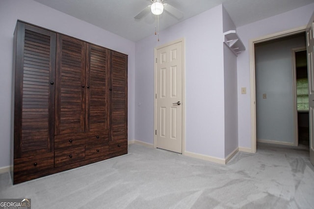 65 Pine Haven Ct, Carrollton, GA 30116 - unfurnished bedroom featuring baseboards, carpet flooring, a ceiling fan, and a closet